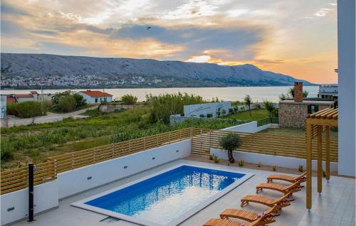 a swimming pool on the balcony of a house at Villa Valentina in Pag
