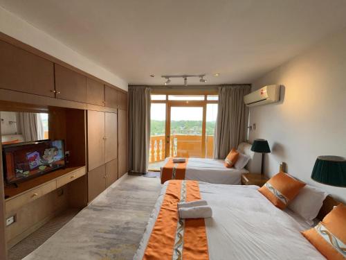 Katil atau katil-katil dalam bilik di Muji style Riverbank suites level 10