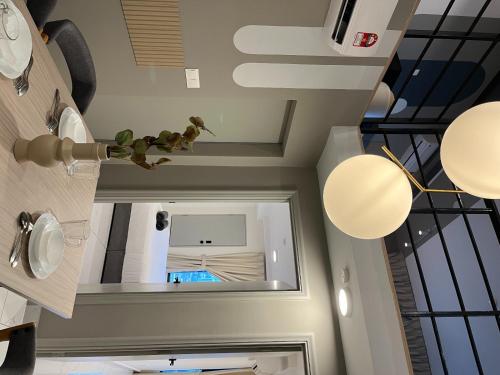 a bathroom with a mirror in a room at Arte cherass by Sweet home in Kuala Lumpur