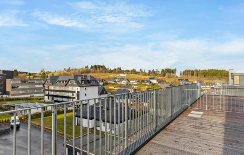 a balcony with a view of a city at 5 Residenz Panoramablick in Winterberg