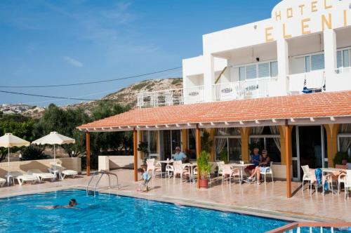 einem Pool vor einem Hotel in der Unterkunft Eleni Hotel in Kefalos