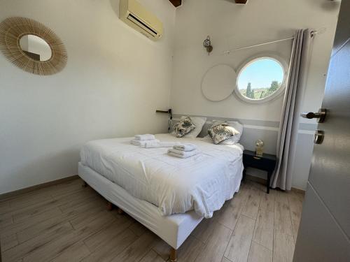 Postel nebo postele na pokoji v ubytování Sète, Belle villa avec piscine !