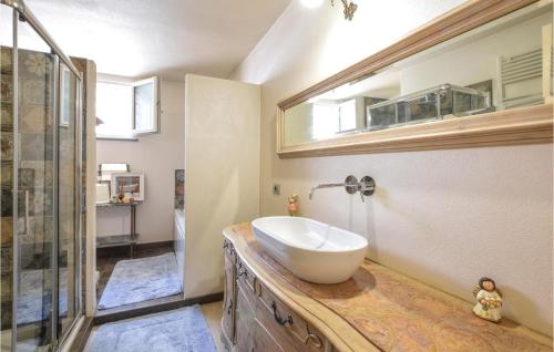 a bathroom with a sink and a shower at Nice Apartment In Santo Stefano Belbo in Santo Stefano Belbo