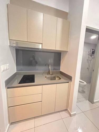 Kuchyň nebo kuchyňský kout v ubytování Mini Studio in Batu Kawan