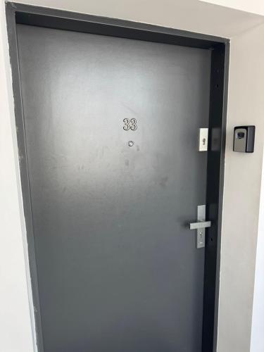 an elevator door with the on it at Apartament Central in Craiova