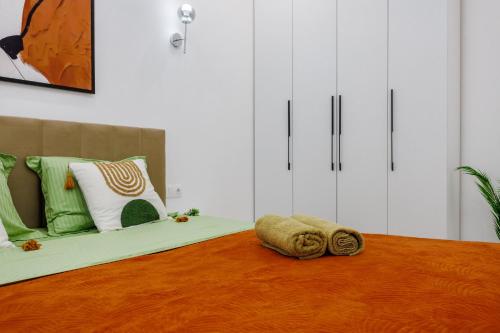 Ένα ή περισσότερα κρεβάτια σε δωμάτιο στο Golden apartments