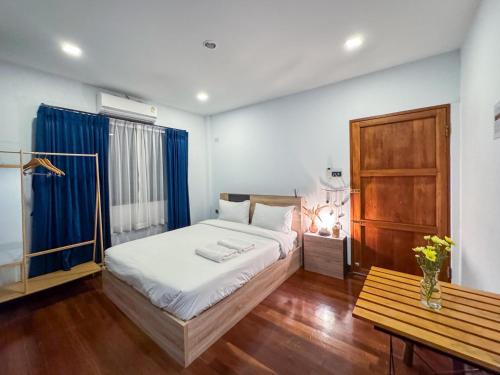 Postel nebo postele na pokoji v ubytování TarTar & Nay Hostel