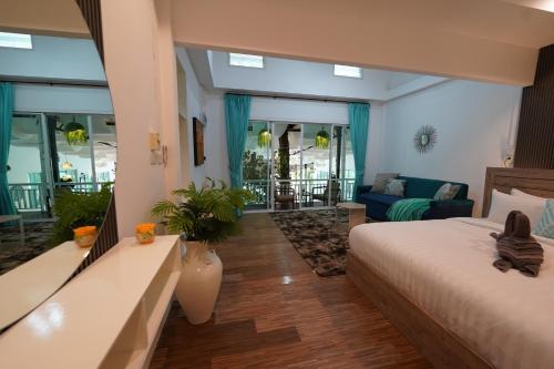 Una cama o camas en una habitación de Tropical Oasis Aoyon Beach House
