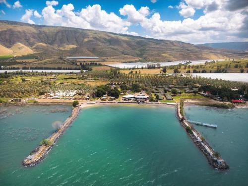 an aerial view of an island in a body of water at Daria- Authentic Israeli Experience in Samra