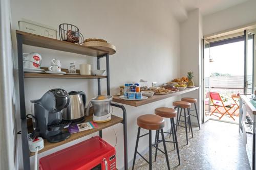 Příslušenství pro přípravu čaje a kávy v ubytování B&B ErinaHouse