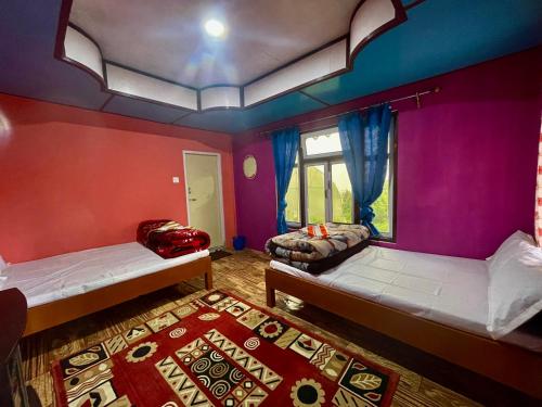 Postel nebo postele na pokoji v ubytování Montavilla Eden Homestay Sittong