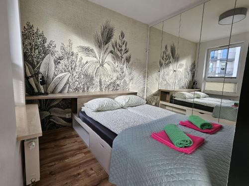 Ένα ή περισσότερα κρεβάτια σε δωμάτιο στο Urban Jungle Apartament Mercury