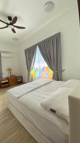 Postel nebo postele na pokoji v ubytování Pearl Castlestay