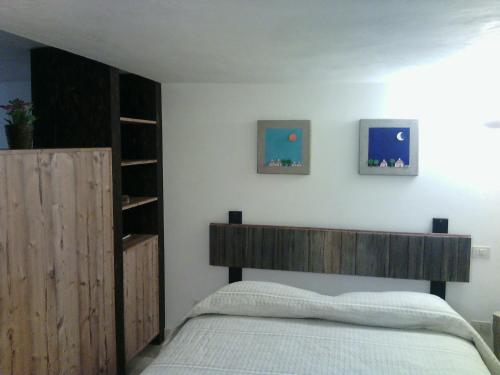Postel nebo postele na pokoji v ubytování Trulli & Grotte Exclusive House