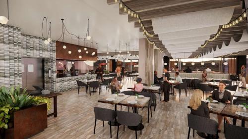 a rendering of a restaurant with people sitting at tables at Black Desert Resort in Ivins