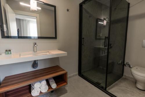 Un baño de Joyful Hotel By Gnl