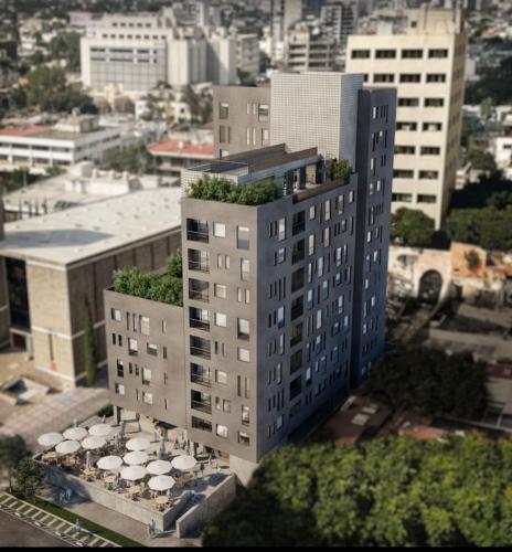 an overhead view of a tall building in a city at LEF 505 Zona Americana in Guadalajara