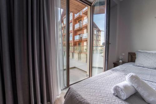 Postel nebo postele na pokoji v ubytování Ski Loft New Gudauri #0231