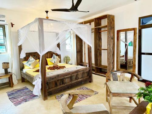 Postel nebo postele na pokoji v ubytování Z-Breeze Zanzibar