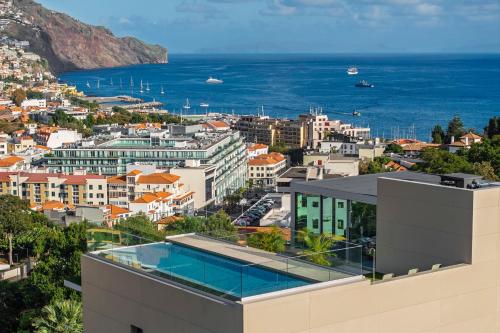 a view of a city from a building at Maravilhas II by An Island Apart in Funchal