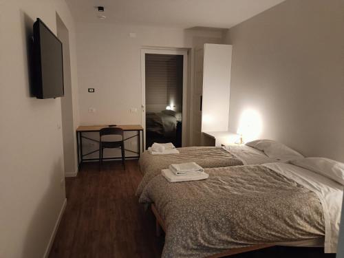 Postel nebo postele na pokoji v ubytování Casa Tua