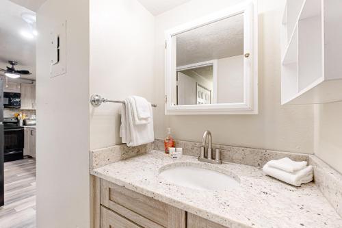 a bathroom with a sink and a mirror at Summit Serenity in Dillon