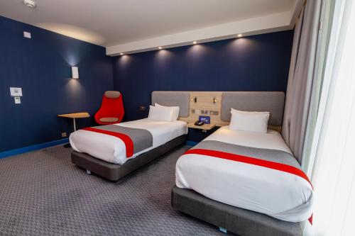 Кровать или кровати в номере Holiday Inn Express - Manchester - TRAFFORDCITY by IHG