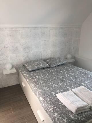 Postel nebo postele na pokoji v ubytování Cantinho do Mercado