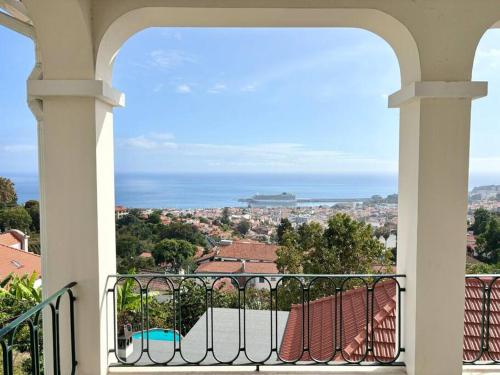 a view of the ocean from a balcony at Villa Oasis Sea View - 3 Bedrooms in Funchal