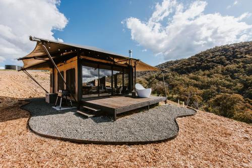 a small building on top of a hill at Wildnest Wilderness in Turondale