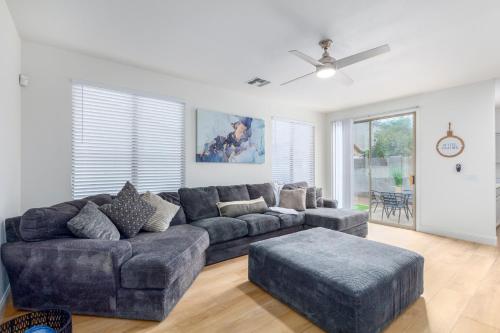 a living room with a couch and a table at San Michelle Luxury Escape -Mesa in Mesa