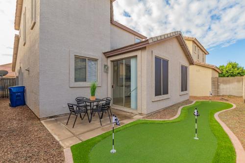 a house with a miniature golf course in the yard at San Michelle Luxury Escape -Mesa in Mesa
