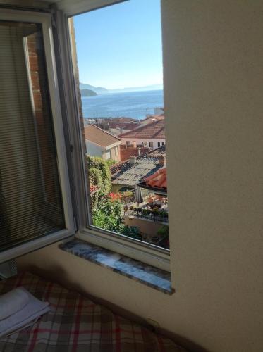 a window with a view of a city at Villa OHRID -"LAKE VIEW" in Ohrid
