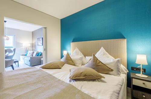 Ένα ή περισσότερα κρεβάτια σε δωμάτιο στο 5 Sterne Apartment Dünenkieker mit einer traumhaften Atmosphäre