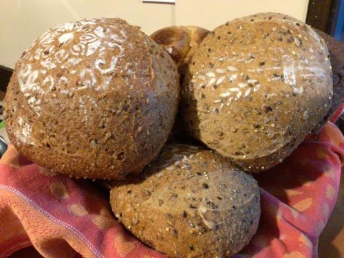 a pile of buns sitting on a cloth at Hôtel Bellevue Bagnoles Normandie in Bagnoles de l'Orne