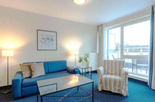 Posezení v ubytování Deichkieker - Ferienwohnung mit Balkon im Herzen von Zingst