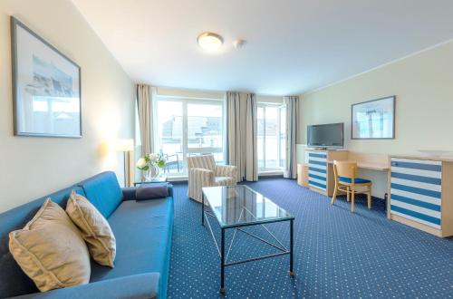 Posezení v ubytování Deichkieker - Ferienwohnung mit Balkon im Herzen von Zingst