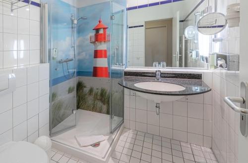 Bilik mandi di Deichblick - gemütliches Apartment im Herzen von Zingst