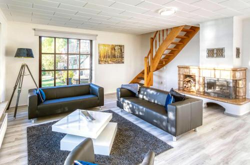 Χώρος καθιστικού στο Feriendomizil Haus am See in Torgelow am See