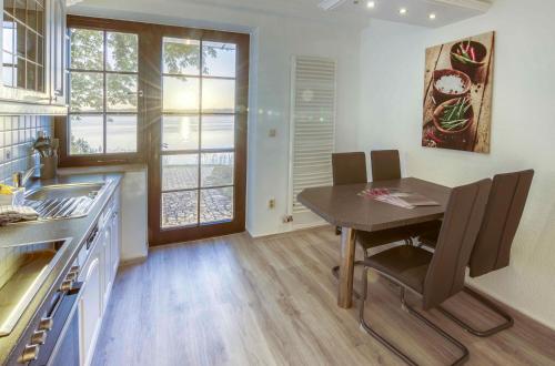 Η κουζίνα ή μικρή κουζίνα στο Feriendomizil Haus am See in Torgelow am See