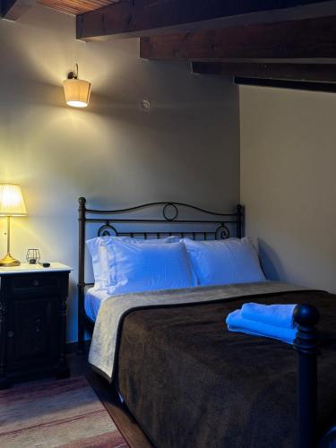 Postel nebo postele na pokoji v ubytování Guesthouse Lousios