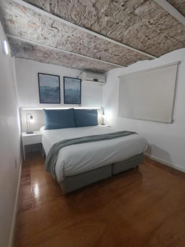 Postel nebo postele na pokoji v ubytování Recoleta Suites