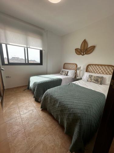 Postel nebo postele na pokoji v ubytování Casa PABLO
