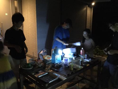 a group of people standing around a table at ichihara homestay-stay with Japanese family - Vacation STAY 17883 in Ichihara