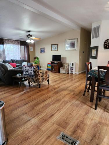 a living room with a couch and a table at Skyfire Ranch in Caldwell