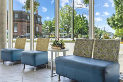 two chairs and a table in front of a window at WorldMark Victoria in Victoria