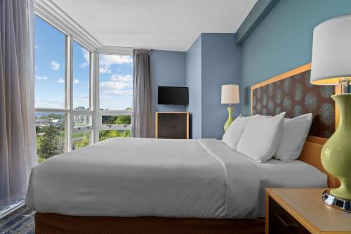 Postel nebo postele na pokoji v ubytování WorldMark Victoria