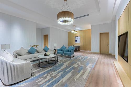 a living room with a couch and chairs and a table at Braira Al Rass بريرا الرس in Al Rass
