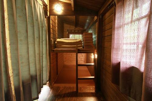 a small room with a bunk bed in a tiny house at Kitakaruizawa Sweet Grass - Vacation STAY 43994v in Kita-karuizawa