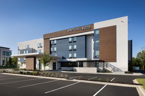 a rendering of a hotel with a parking lot at SpringHill Suites by Marriott Bowling Green in Bowling Green